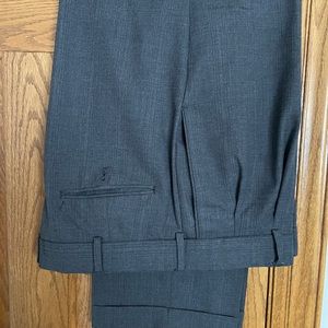 Stafford 36x29 pants. Polyester/wool blend. Used but very good condition.